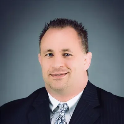 A headshot of Dr. John Kocka of Ohio Men's Health